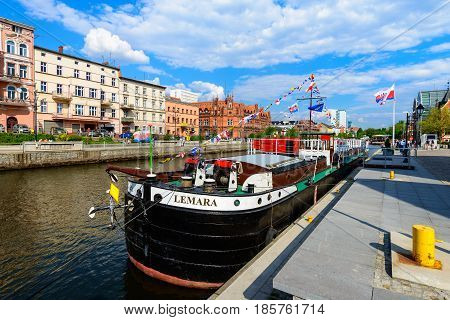 Bydgoszcz, Poland - May 8, 2016; Old Town And Tourist Boat - Cruise Ship On Brda River