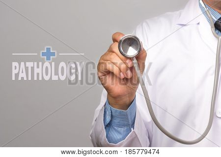 Doctor holding a stethoscope and word 
