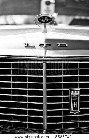 PAAREN IM GLIEN GERMANY - MAY 19: Hood ornament and grille insignia a full-size car Ford LTD (Americas) black and white The oldtimer show in MAFZ May 19 2013 in Paaren im Glien Germany