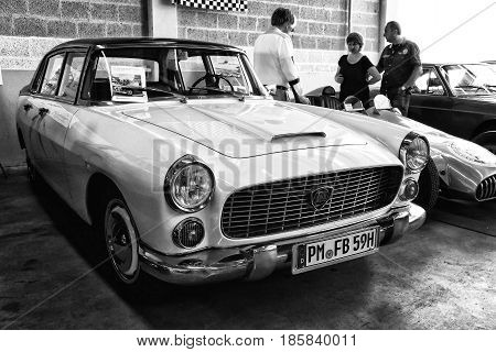 PAAREN IM GLIEN GERMANY - MAY 19: Small family car Lancia Appia 3rd series black and white 