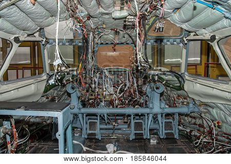 Kiev Ukraine - July 7 2012: Plane cockpit being serviced and maintenanced during the check at a plane repair facility