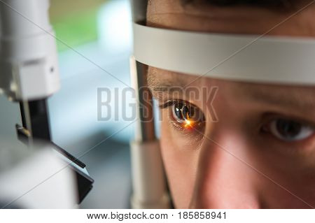 Research and scanning eye close-up photos retinal diagnostics in ophthalmology