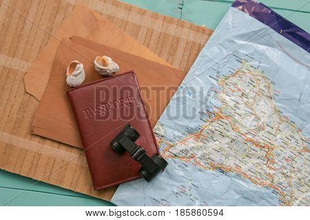 Travel Planning - Map With Passport, Shells And Binoculars