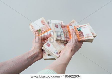 Hand Holding Many Of The Russian Banknotes
