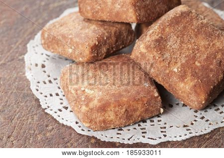 Pastry spisy on a timber board close up