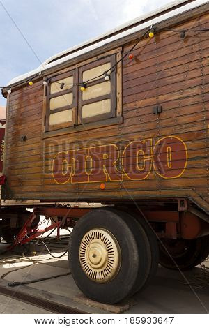Circus wooden vintage caravan with painted spanish circo lettering
