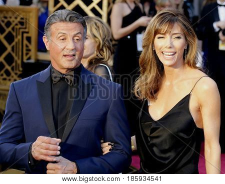 Jennifer Flavin and Sylvester Stallone at the 88th Annual Academy Awards held at the Hollywood & Highland Center in Hollywood, USA on February 28, 2016.