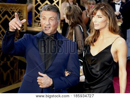 Jennifer Flavin and Sylvester Stallone at the 88th Annual Academy Awards held at the Hollywood & Highland Center in Hollywood, USA on February 28, 2016.