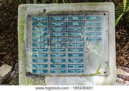 KEY WEST USA - AUG 27 2014: graveyard for the cats in Earnest Hemmingways garden. The cats are named like famous actors.