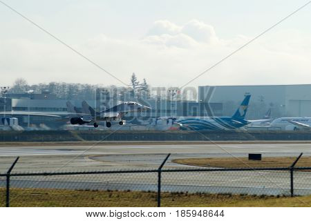 EVERETT, WASHINGTON, USA - JAN 26th, 2017: A brand new Ryanair Boeing 737-800 Next Gen MSN 44766, Registration EI-FTP returns from a successful test flight, landing at Snohomish County Airport or Paine Field.