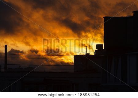 Sunset in the city. Fire sunset. Sky
