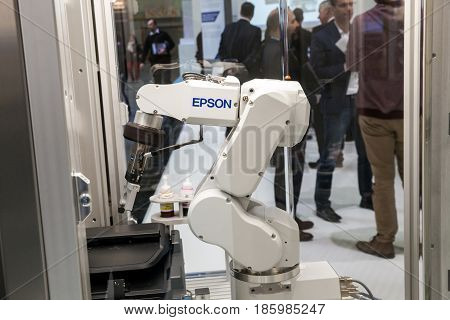 Hannover, Germany - March, 2017: Epson industrial robot hand on exhibition Cebit 2017 in Hannover Messe, Germany