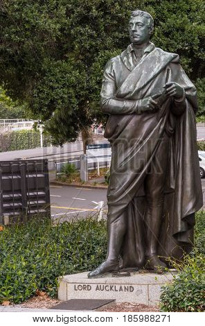 Auckland New Zealand - March 5 2017: Bronze statue of standing Lord Auckland set in green vegetation on Aotea Square.