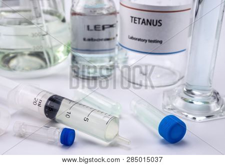 Test Tetanus In Laboratory, Syringe With Medication For Sampling, Conceptual Image, Composition Hori