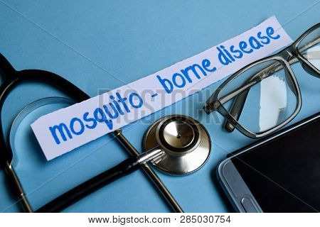 Conceptual Image With Mosquito - Borne Disease Inscription With The View Of Stethoscope, Eyeglasses 
