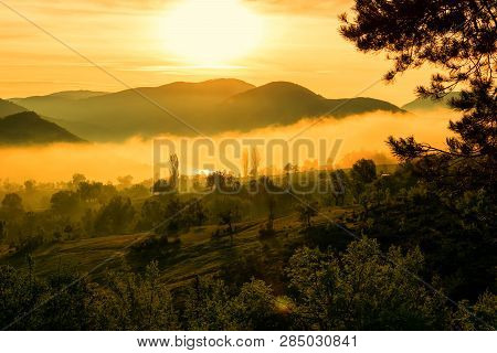 Foggy Sunrise Over Rodopi Mountain, Bulgaria. Mountain Landscape.