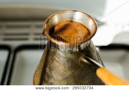 Making Black Coffee In Cezva For The Breakfast In The Early Morning.
