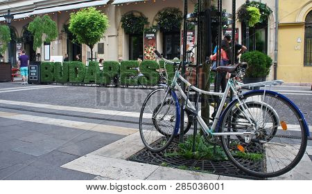Budapest. Hungary - 15 07 2015: Bicycle And Cafe In Zrinyi Utca Street