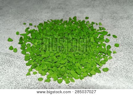 Green Stones Loose On Gray Marble Base Here