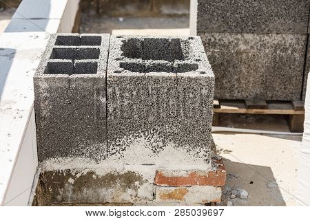 Close Up Of Grey Airbrick With Holes. Industrial Construction Site Objects Concept.