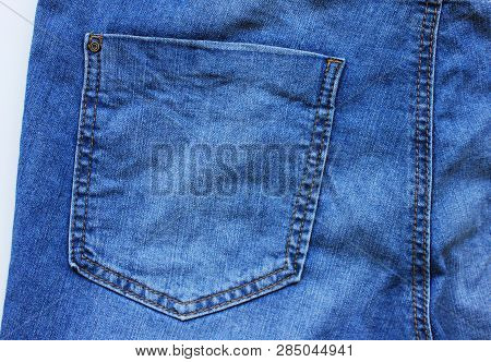 Denim Blue Jeans Pocket On Back Side, Top View Of Classic Jeans. Simple Texture Of Light Blue Modern
