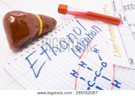 Note With Inscribed With Ethanol Alcohol And Chemical Formula Lies Near Liver, Lab Test Tubes With B