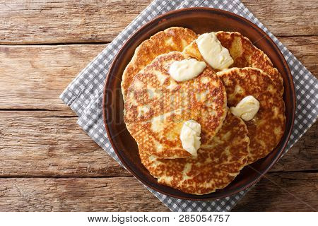 Gorditas De Azucar (sweet Griddle Cakes) With Butter Close-up On A Plate. Horizontal Top View