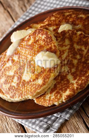 Gorditas De Azucar (sweet Griddle Cakes) With Butter Close-up On A Plate. Vertical