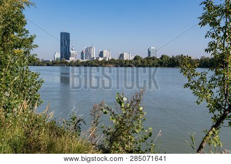 Skyline Of The High Buildings Near The Danube In Vienna, Austria On A Sunny Day In Summer