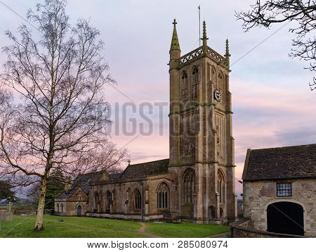 Sunset On St John The Baptist Church, Colerne, Wiltshire, Uk 
13th Century With 15th Century Tower 
