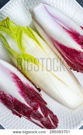 Food Background, Flat Lay Concept With Fresh Green Belgian Endive Or Chicory And Red Radicchio Veget