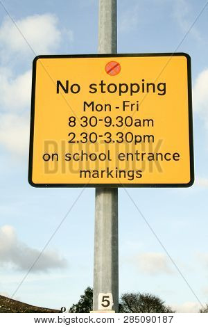 No Stopping Sign Yellow Outside Lamp Post