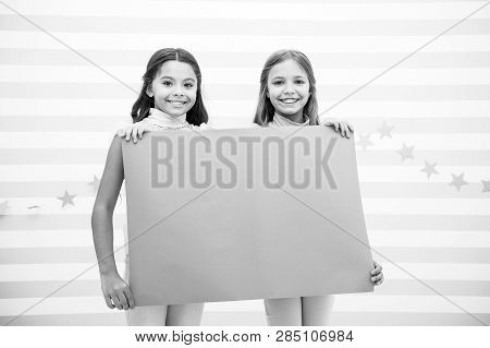 Kids Announcement Concept. Amazing Surprising News. Girl Hold Announcement Banner. Girls Kids Holdin
