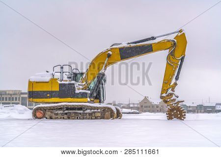 Construction Vehicle On A Winter Landscape In Utah