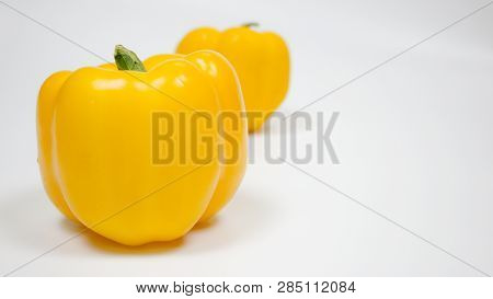 Bell pepper or capsicum in white background, yellow, red, green bell pepper.