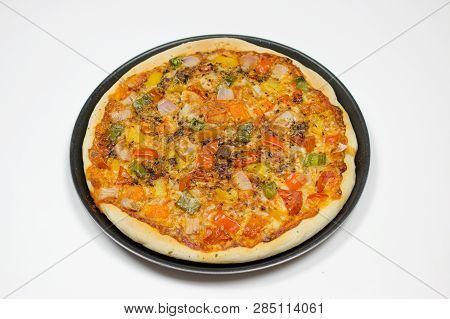 Pizza With Sauce, Bellpepper, Seasoning, Tomato In White Background