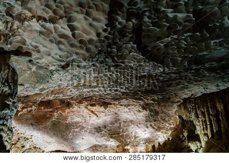 Cave Deep Dark Inside. Underground Of Stone Rock Mountain. Ha Long Vietnam Nature Background