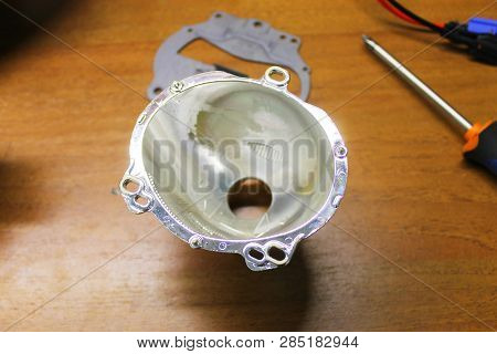 Macro View Of Repairing, Installation And Turning Headlight Of Modern Automobile And Car Projector L