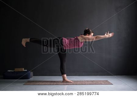 Woman Practicing Yoga, Doing Warrior Iii Exercise, Virabhadrasana 3 Pose
