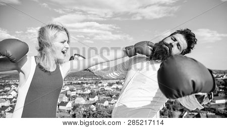 Couple Boxing Gloves Fight Sky Background. Henpecked Guy Attacked By Wife. Girl Confident Strength P