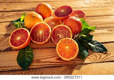 Orangen Fruit Or Blood Oranges Organic Fruits In Close-up. Outdoor Shot In The Sunshine