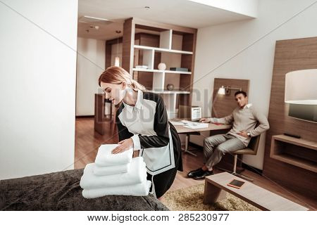 Pleasant Hard-working Housekeeper Bringing New White Towels