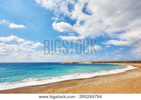 Beautiful Wild Beach With Clear Turquoise Water And Waves. Lara Beach, Cyprus.