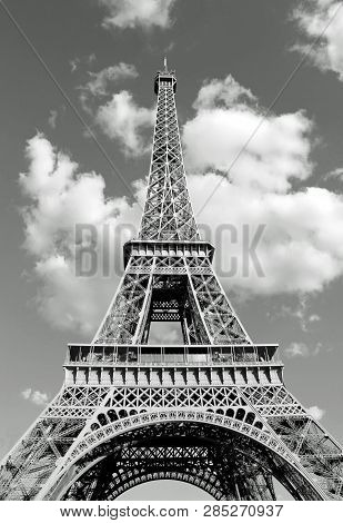 Bottom View Of Eiffel Tower In Black And White Effect With Clouds