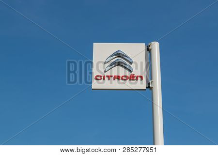 Roncq,france-february 20,2019: Citroen Brand Logo On A Blue Sky. Citroën Is A French Brand Of Cars,v