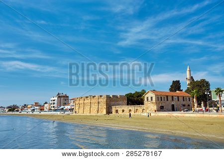 The Busy Finikoudes Beach Next To The Old Castle In The City Centre, Larnaca, Cyprus.