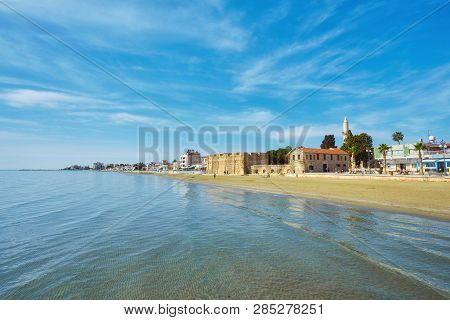 The Busy Finikoudes Beach Next To The Old Castle In The City Centre, Larnaca, Cyprus.