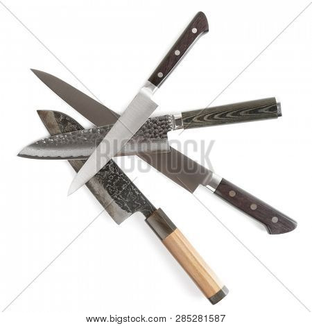 Old and new knives shot on white surface