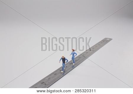 A Mini Figure Runner Race On Rule