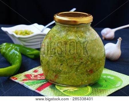 Adjika From Green Bell Peppers, Garlic And Chili Peppers